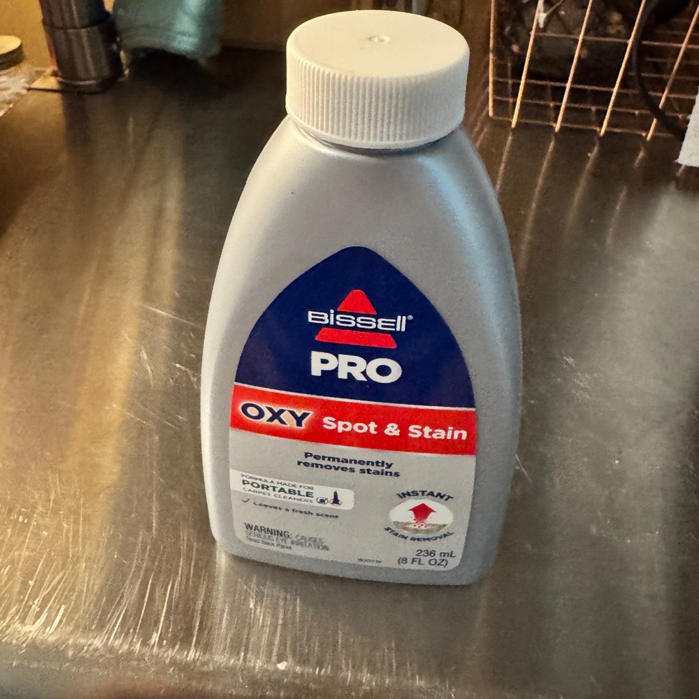 Bissell Spot & Stain Cleaner - Gray Bottle with Blue and Red Label